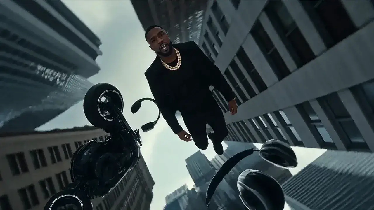 A rapper performs across four escalating scenes, from a sports car to a fifty-storey giant